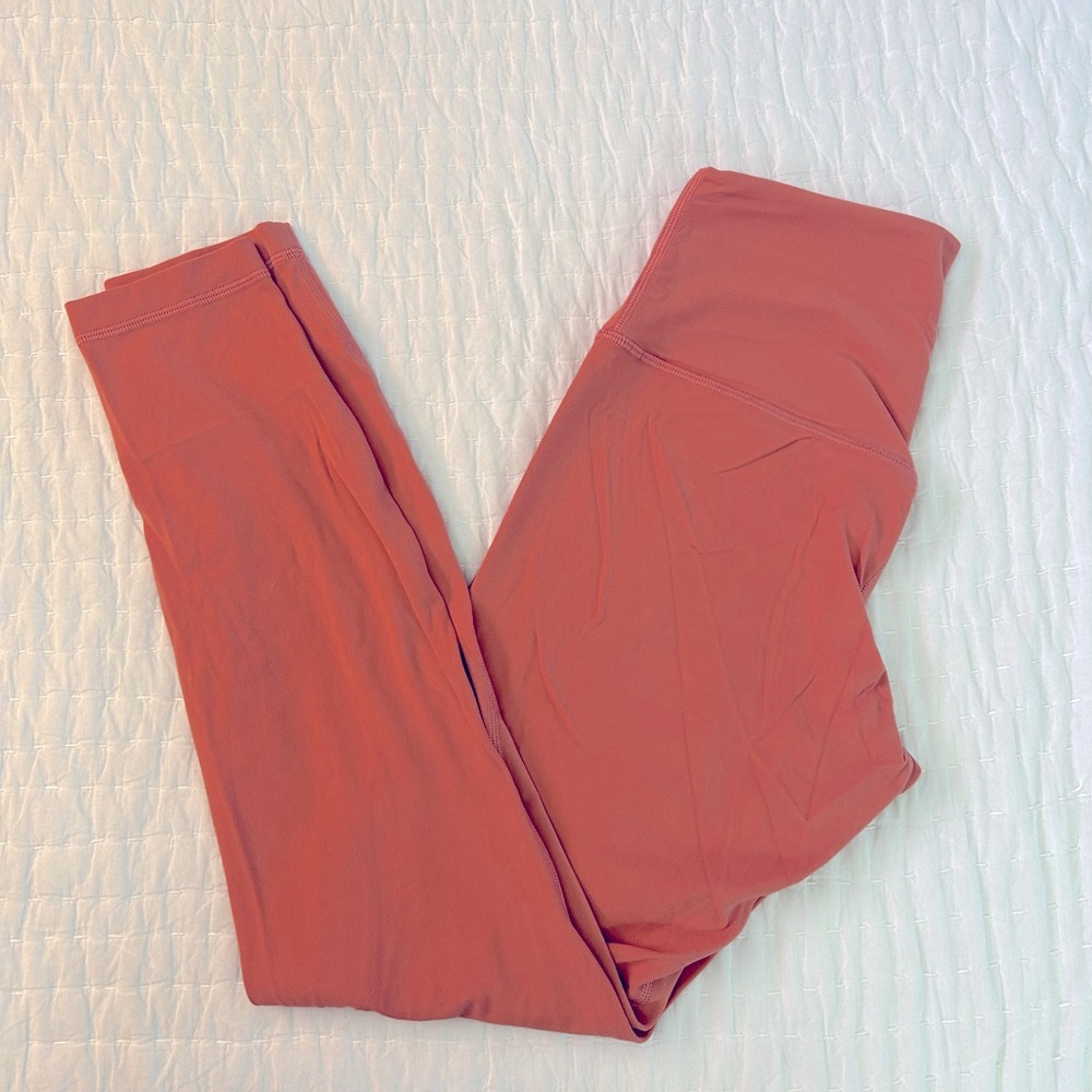 Peachy-orange Lululemon Align leggings